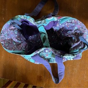 Cute Floral Canvas Tote with Two Large Side Zipper Pockets.